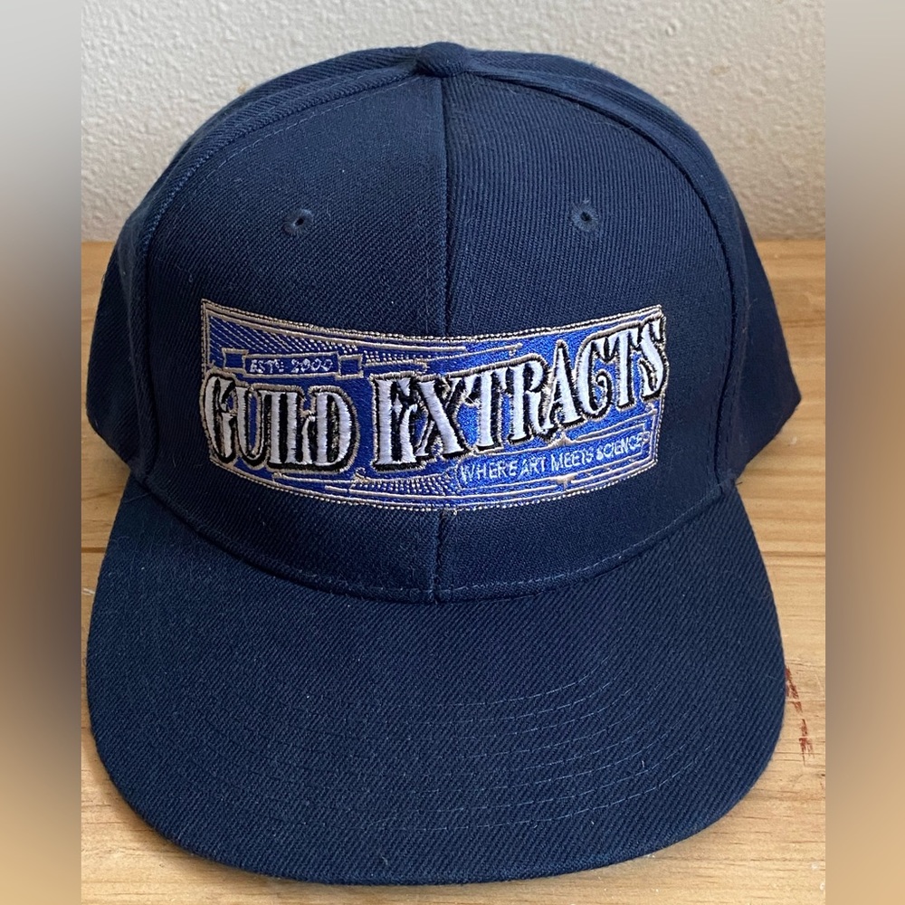 GUILD EXTRACTS FLAT BRIM TRUCKER CAP